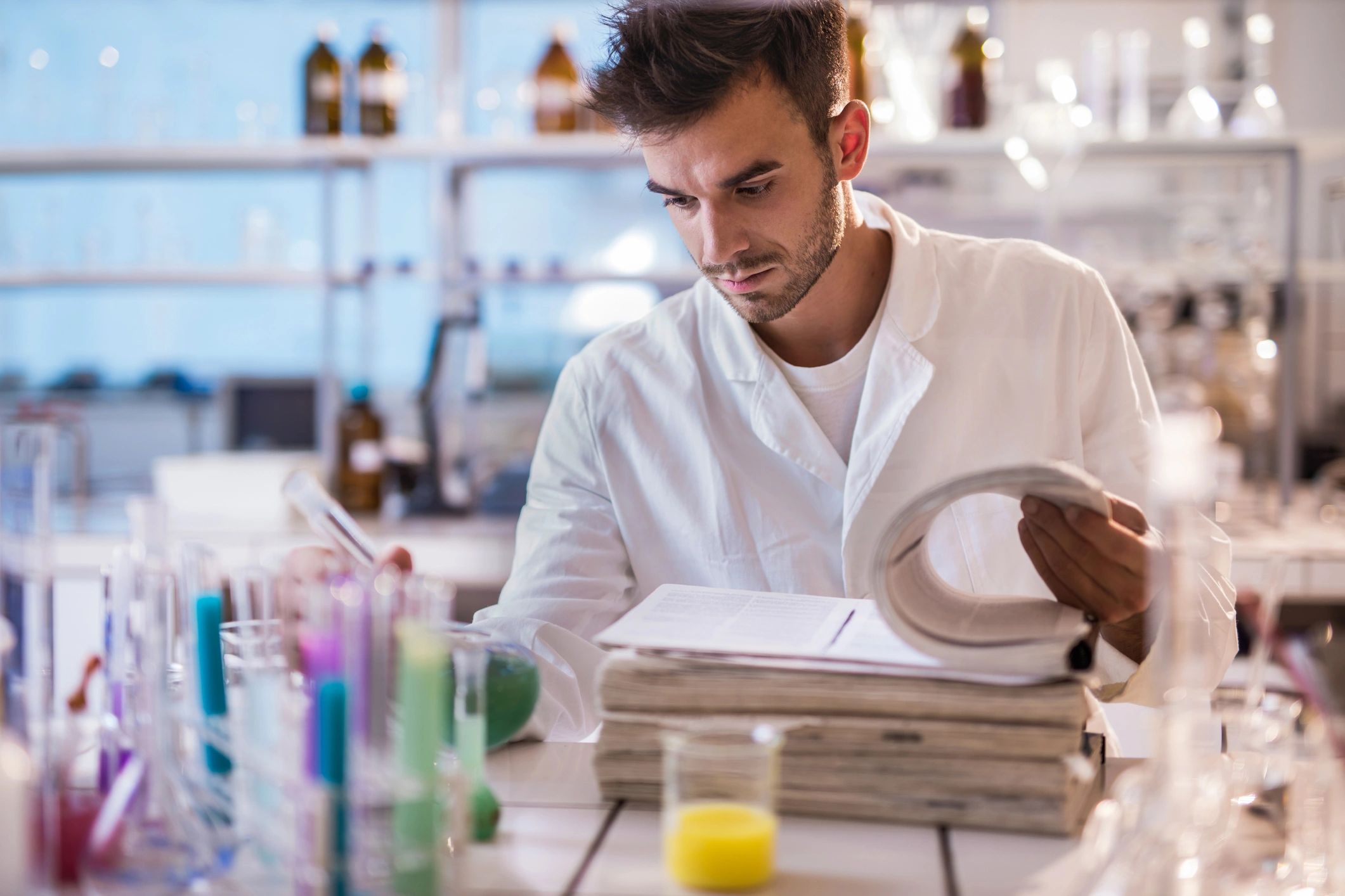 Doctor reviewing medical research on a tablet